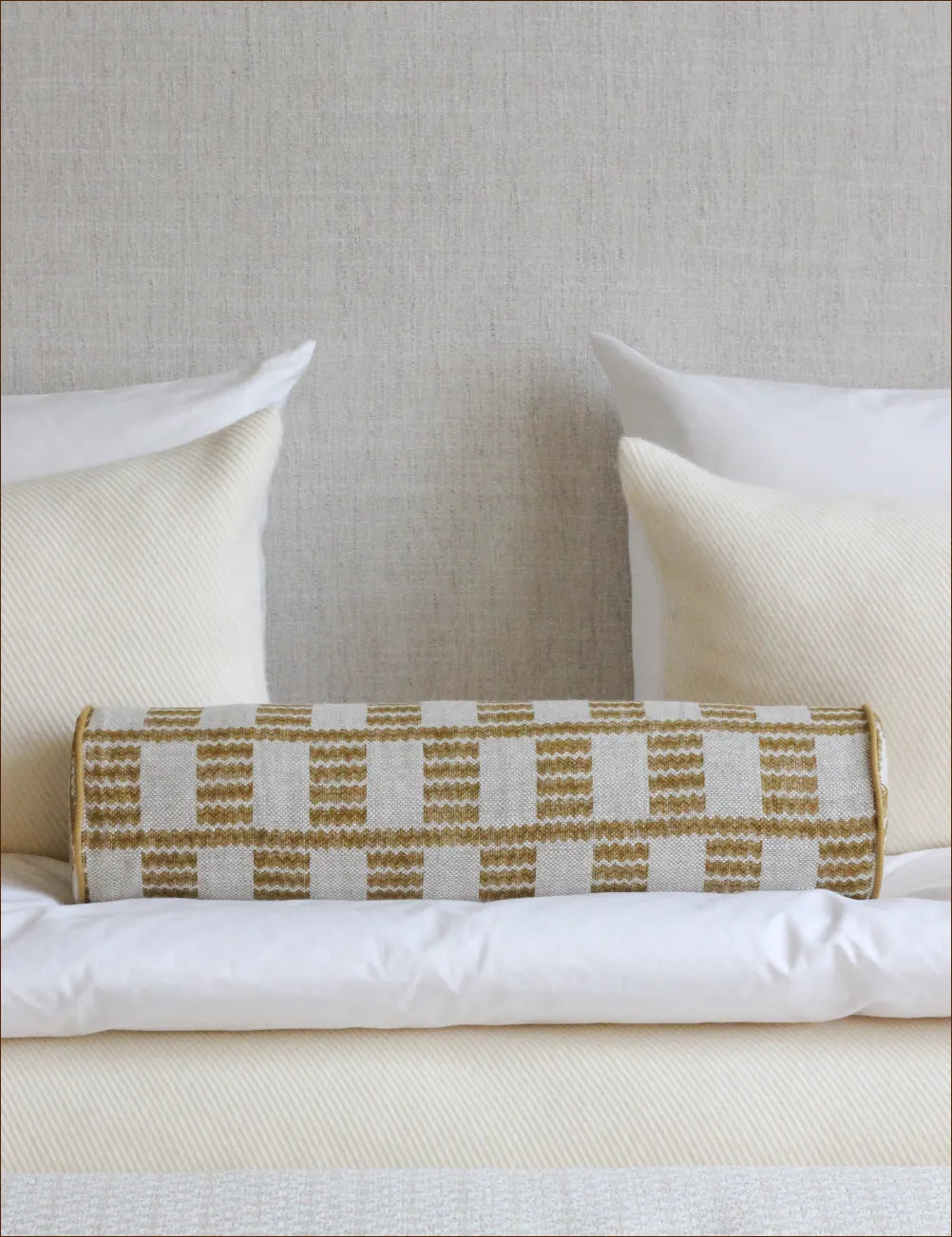 Bolster cushion in Cove 011 by Fermoie