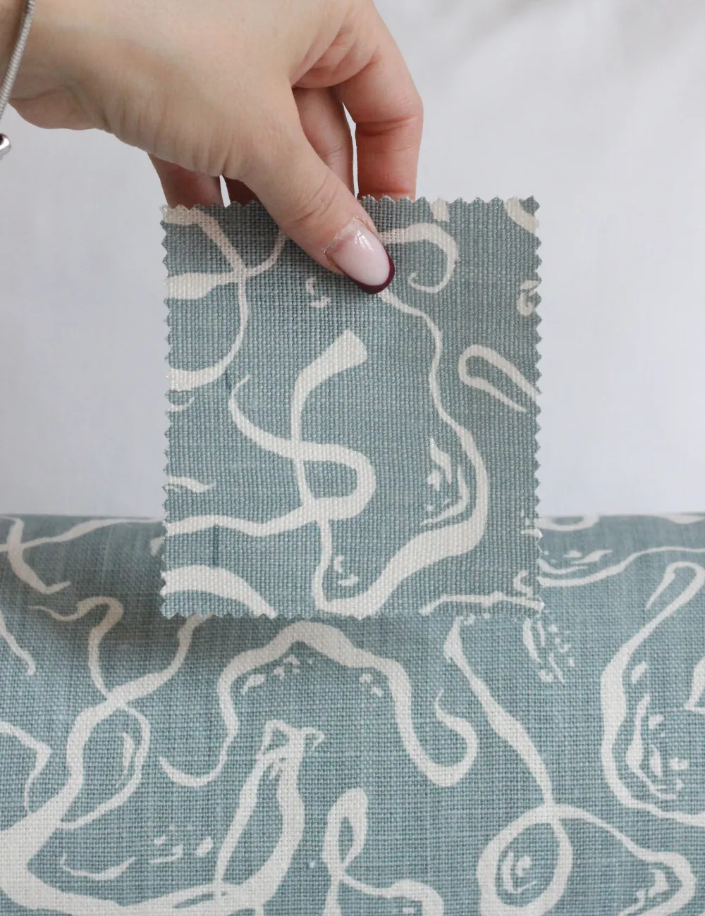 Bolster cushion in Willow Ink (Beata Heuman)