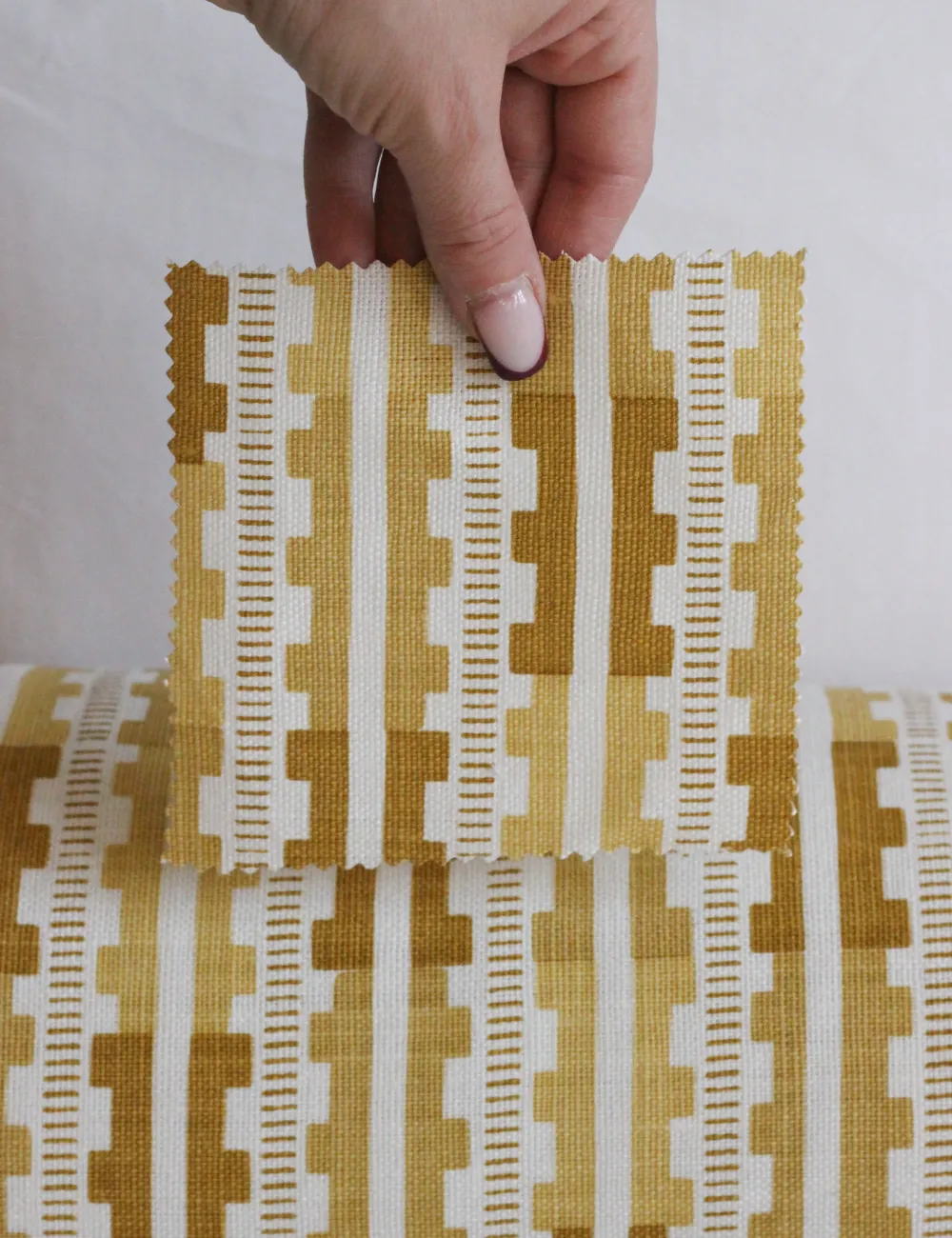 Bolster cushion in Willow Ink (Beata Heuman)