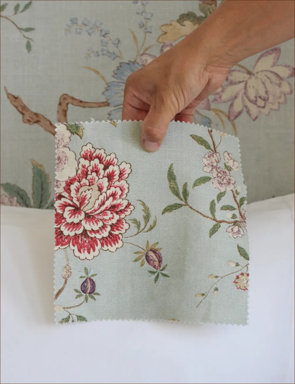 Bolster cushion in Willow Ink (Beata Heuman)